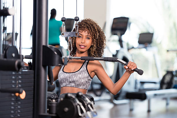 istock Arms and back GYM exercises. 612378256