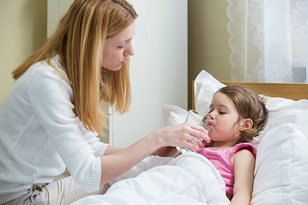 istock Sick child with high fever 612379848