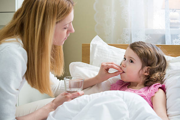 istock Sick child with high fever 612380810