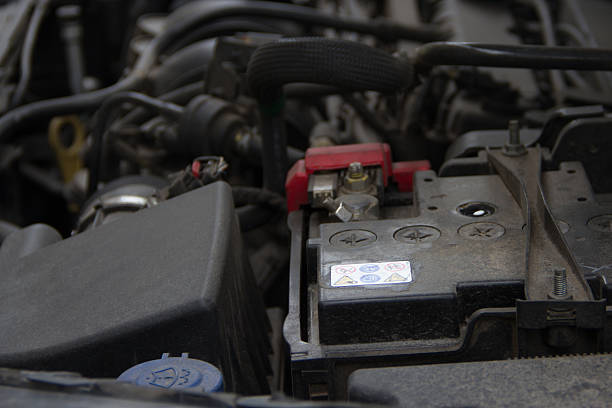 istock Car engine under the open hood and dust 612385238