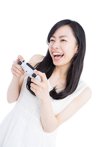 istock Woman playing video games 612385578
