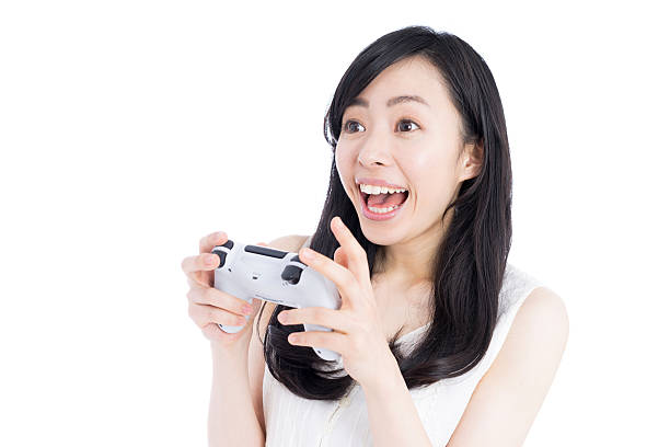 istock Woman playing video games 612385726