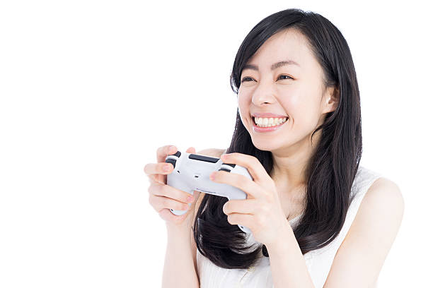 istock Woman playing video games 612385774