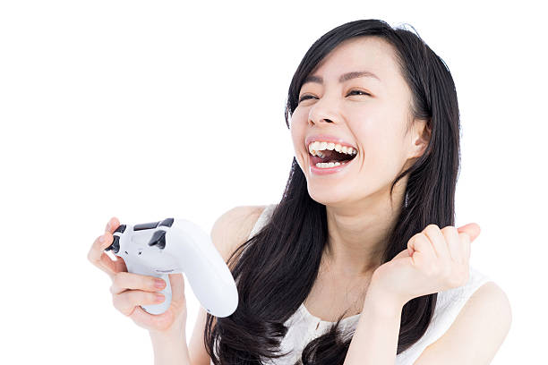 istock Woman playing video games 612385888