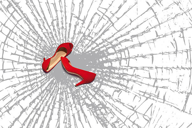 red shoes, fragments of broken glass stock photo