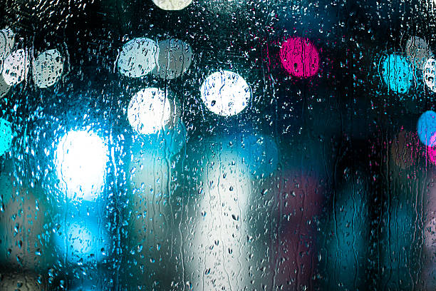istock Defocused lights, city, night, rain 612386422