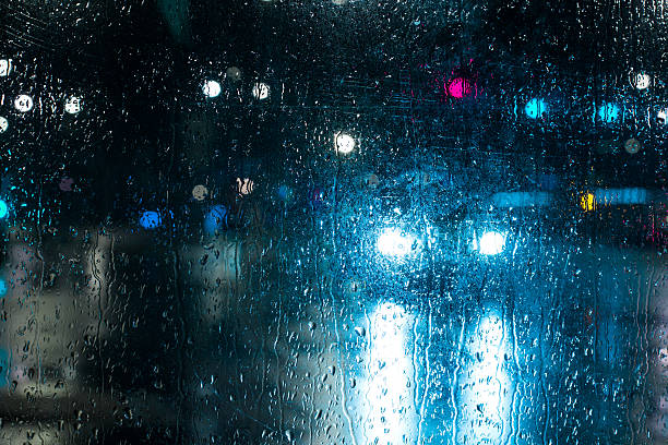 istock Defocused lights, city, night, rain 612386770