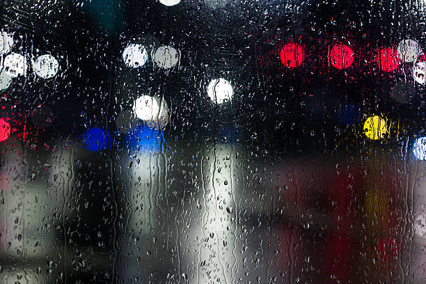 istock Defocused lights, city, night, rain 612387020