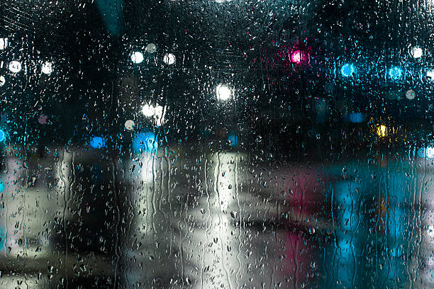 istock Defocused lights, city, night, rain 612387136