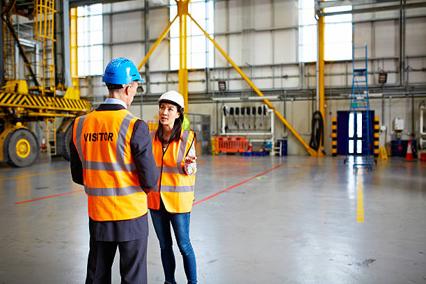 istock Talking logistics on the warehouse floor 612387668