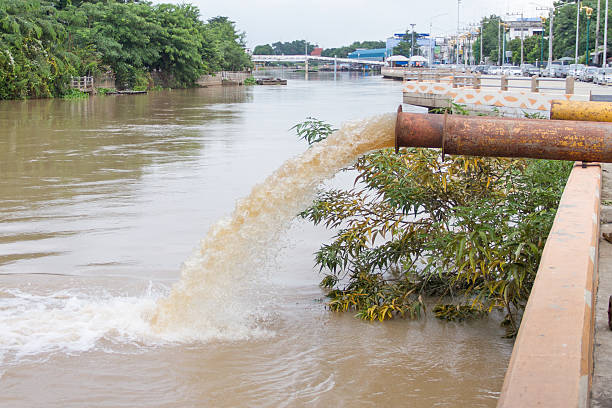 istock Flood water being pumped from pump station 612388364