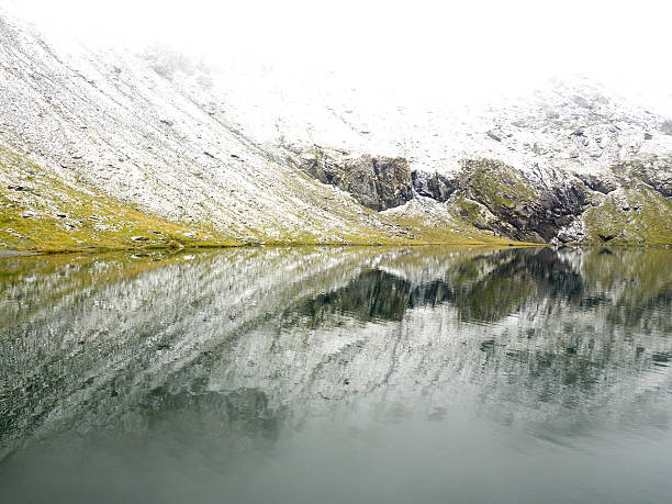 mountain lake in winter - konigsee стоковые фото и изображения