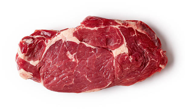 istock Fresh raw beef steak isolated on white, from above 612392084