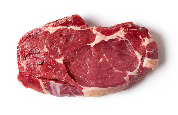 Fresh raw beef steak isolated on white, from above Fresh raw beef steak isolated on white background, top view scotch fillet stock pictures, royalty-free photos & images