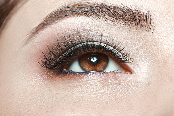 istock beautiful brown woman's eye 612392636