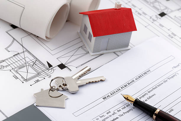 istock Real estate purchase agreement 612392678