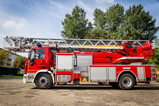 Modern car fire engine with ladder