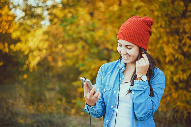 istock woman injoing music 612393226