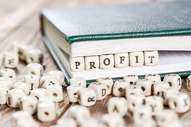 istock Profit word written on a wooden block. 612393682
