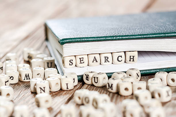 istock Search word written on a wooden block. 612393928