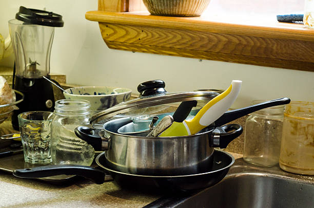 istock Dirty dishes in the sink 612396584