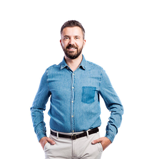 istock Hipster man in blue denim shirt, studio shot, isolated 612398768