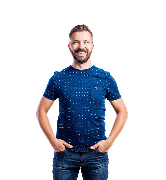 istock Hipster man in blue t-shirt, studio shot, isolated 612399378