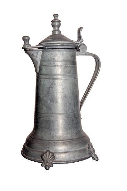 istock Coffeepot or wine decanter of tin 612401590