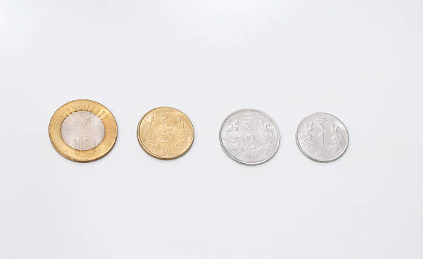 istock coins in pile isolated on white 612401966