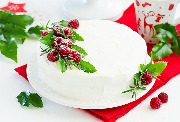 istock New Year or Christmas cake with raspberries, selective focus. 612402496