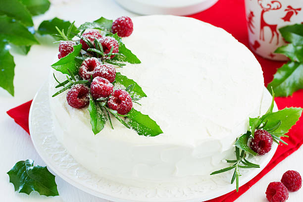 istock New Year or Christmas cake with raspberries, selective focus. 612402790