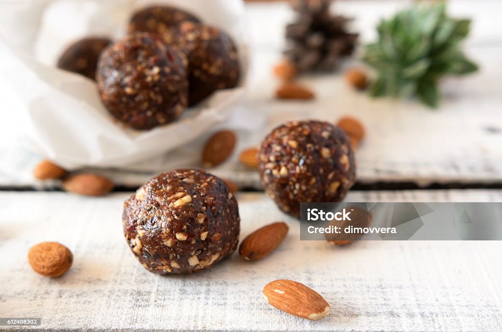 Vegan sweet balls food on table Vegan sweet delicious almond cocoa balls healthy and tasty food on wooden table Sphere Stock Photo