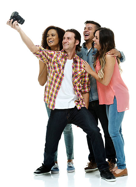 istock Four friends taking a selfie 612409026