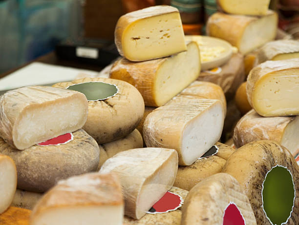 istock Delicious cheese in food shop display 612409134