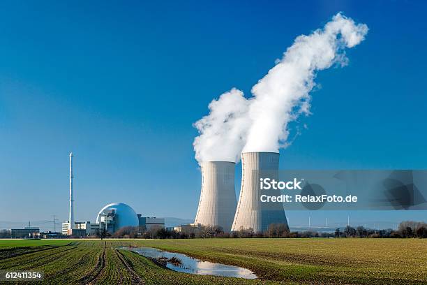 Nuclear Power Station Grohnde With Steaming Cooling Towers Stock Photo - Download Image Now