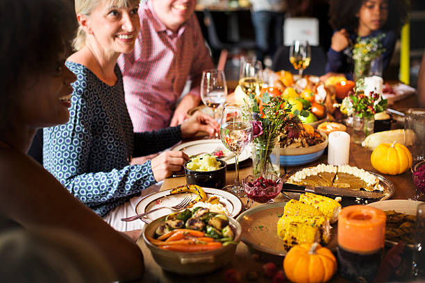 istock People Celebrating Thanksgiving Holiday Tradition Concept 612412710