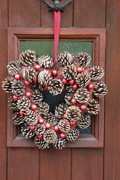 istock Christmas Cone Decoration on Door 612417174