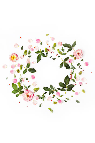 istock Floral round frame with rose flowers, petals, red berries 612419526