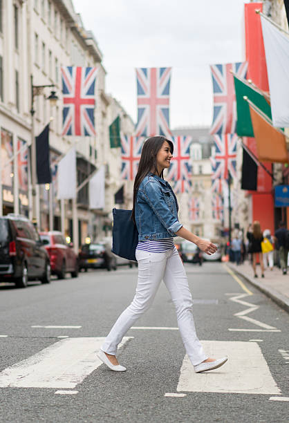 istock Woman walking around London 612419946