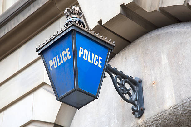 Police Station Sign Police Station Sign; England; UK police station stock pictures, royalty-free photos & images