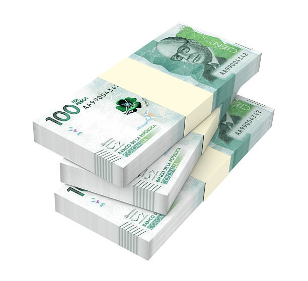 istock Stack of Colombian pesos bills isolated over white 612478732