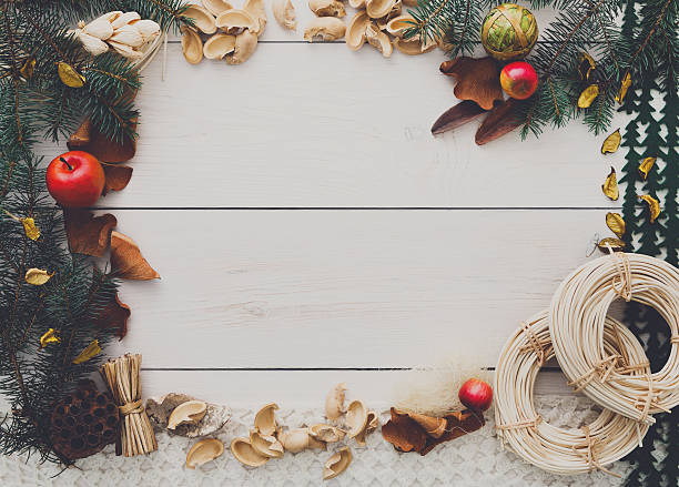 istock Christmas decoration handmade frame on white wood background copy space 612478796