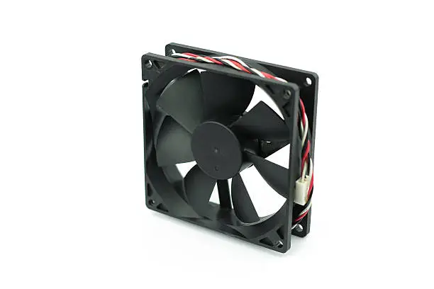 Photo of Computer fan isolated on a white background