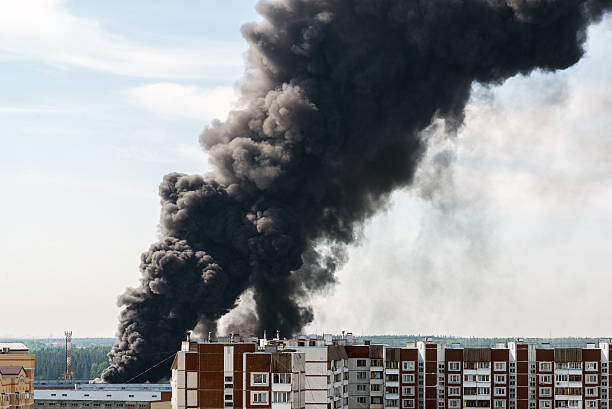 istock Black smoke from a major fire in Moscow, Russia 612480306