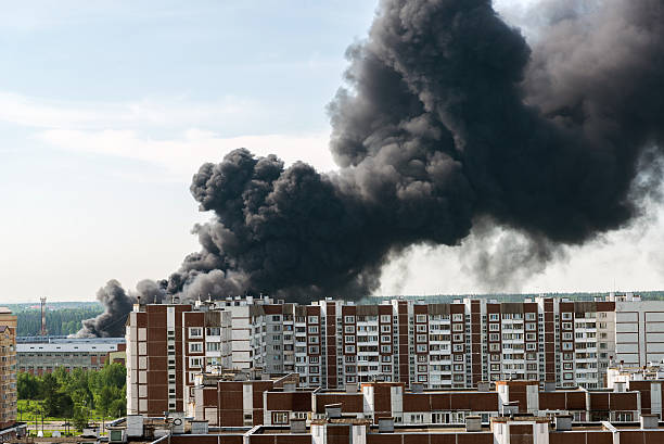 istock Black smoke from a major fire in Moscow, Russia 612480790