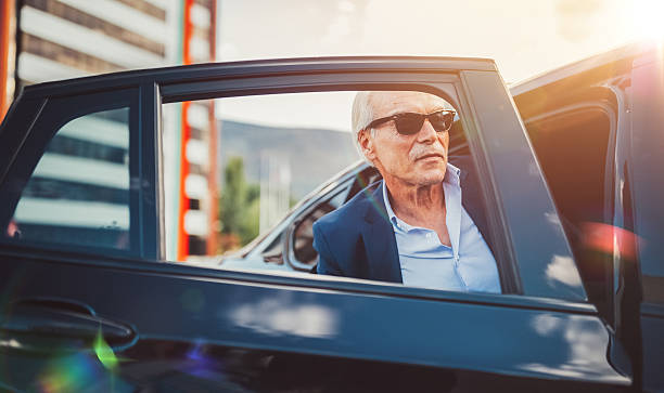 istock Busy man hailing a taxi 612481178