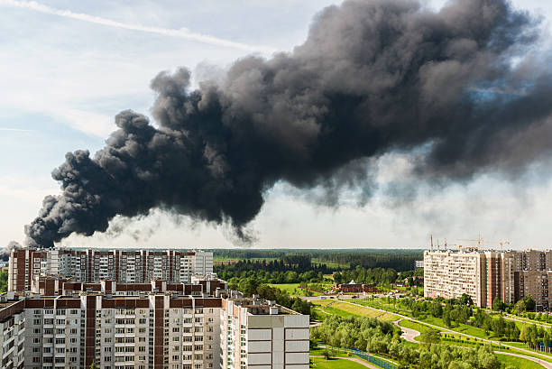 istock Black smoke from a major fire in Moscow, Russia 612481288