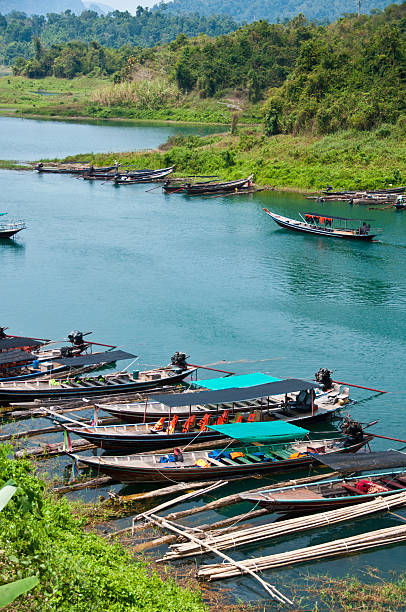 istock Group of long tailed boats floating 612482994