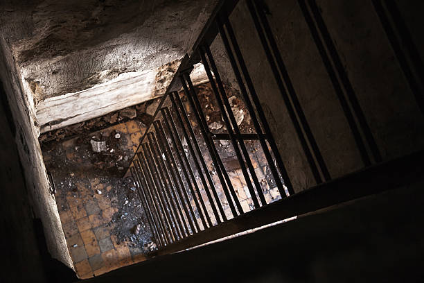 Weathered and abandoned outdoor stairs with rusty railing