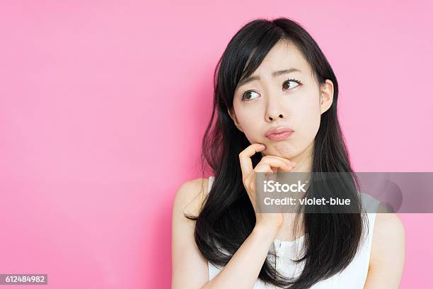 Woman Thinking Stock Photo - Download Image Now - Adult, Adults Only, Asian and Indian Ethnicities